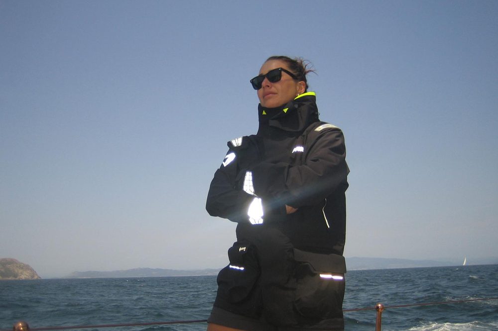 Buse on deck in foul-weather gear