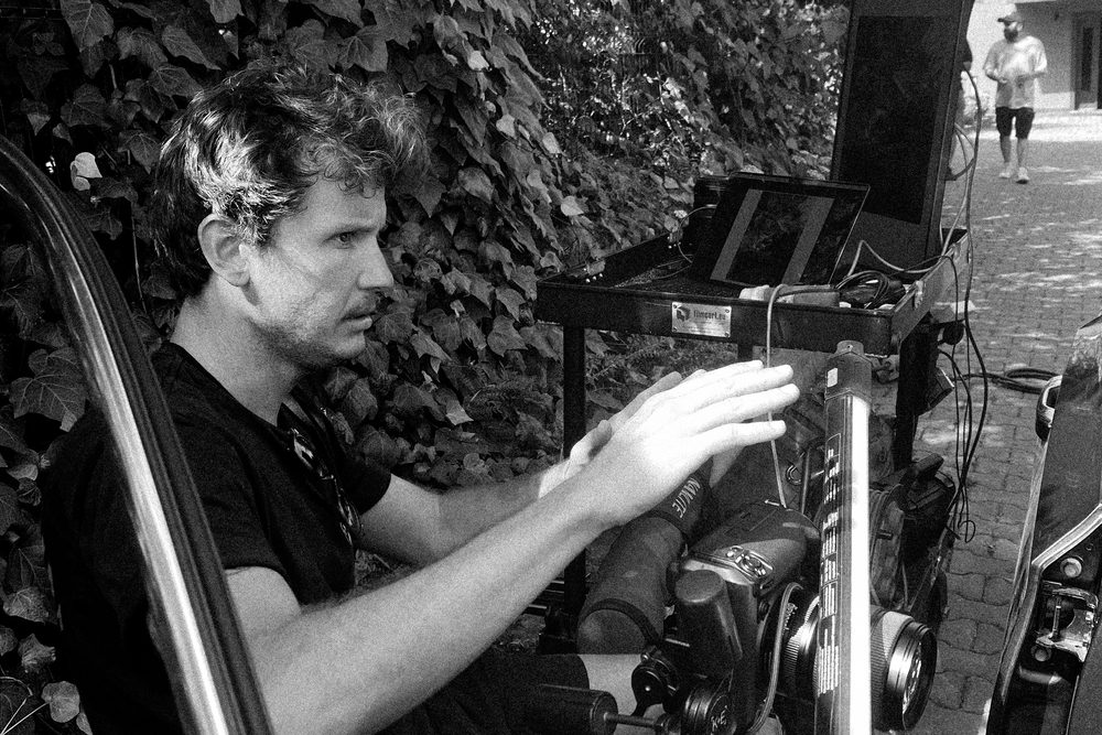 Kaan behind the camera on a shoot